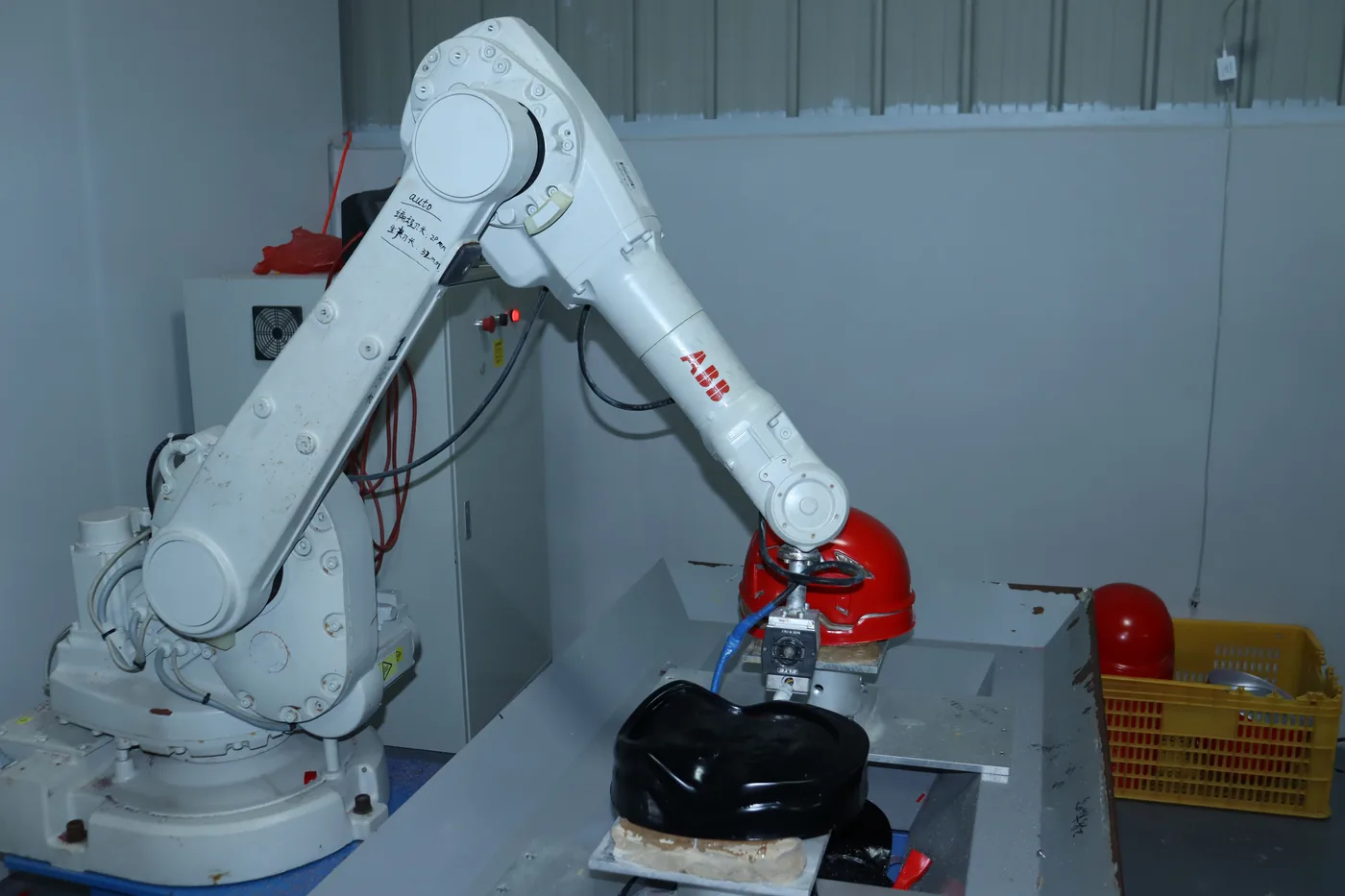 Automated Robotics - Spoton helmet factory China